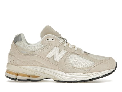 New Balance 2002R coloris blanc cassé Homme Style M2002RCC FR