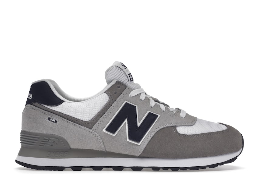 New Balance 574 sneakers in gray and white