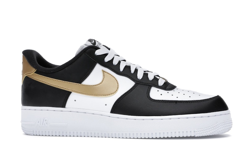 Black white and gold nikes