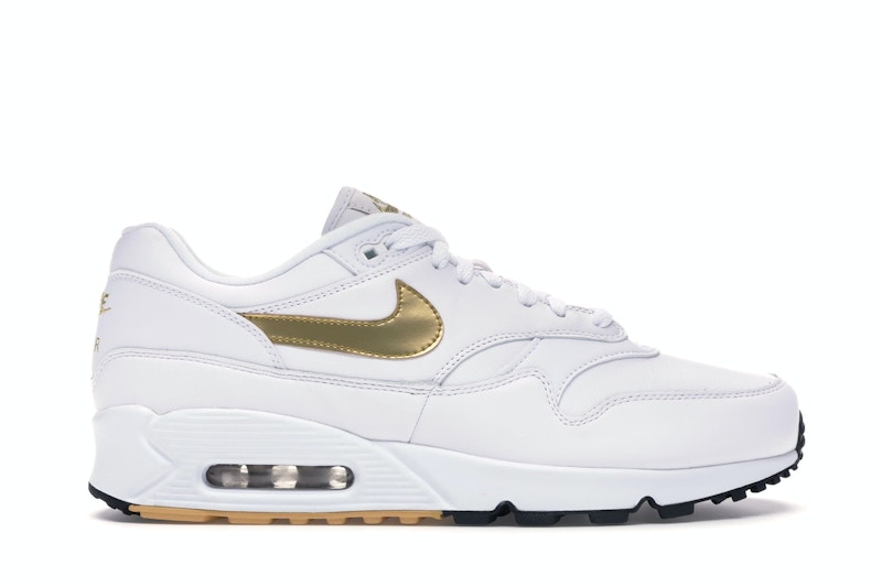 White and 2025 gold nike sneakers