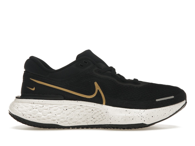 Nike free run black and gold top