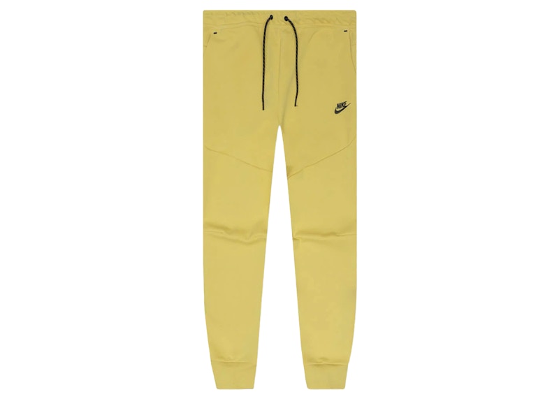 pantalon nike dorado
