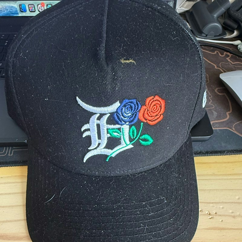PJ Tucker Black Cap Embroidered Rose D Logo