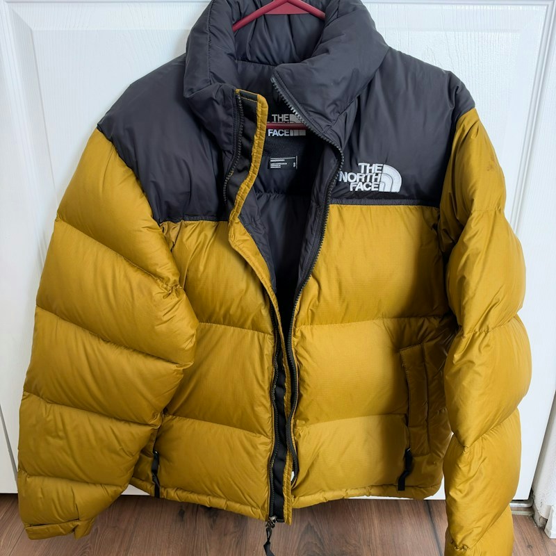 The North Face Retro 1996 Nuptse Jacket Golden Hour TNF Black