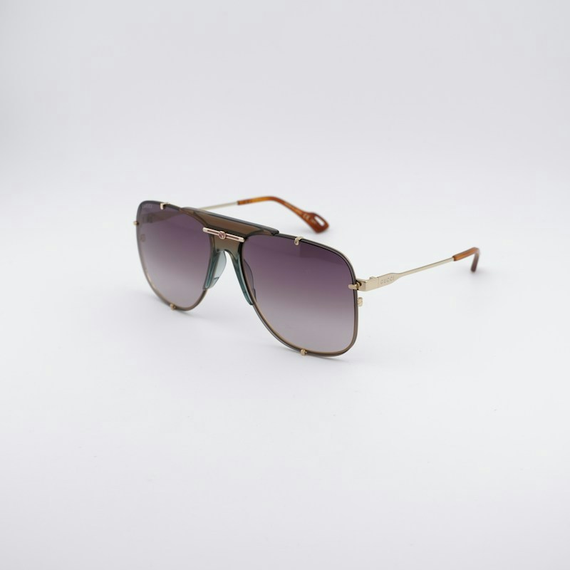Gucci GG0739S 002 Aviator Sunglasses Gold / Brown