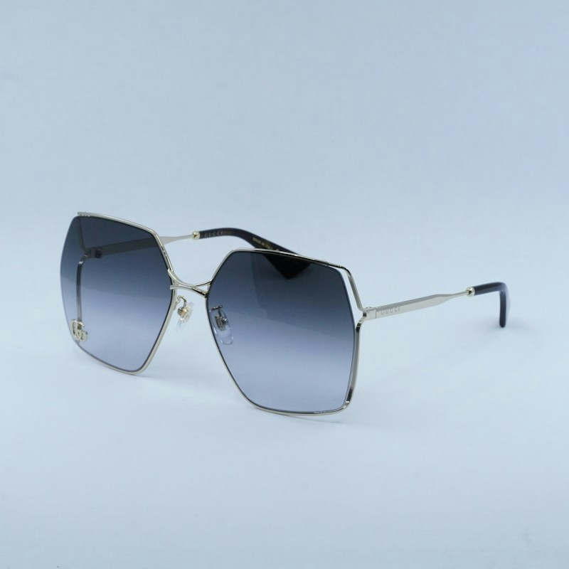 Gucci GG0817S 006 Geometric Sunglasses Gold / Grey