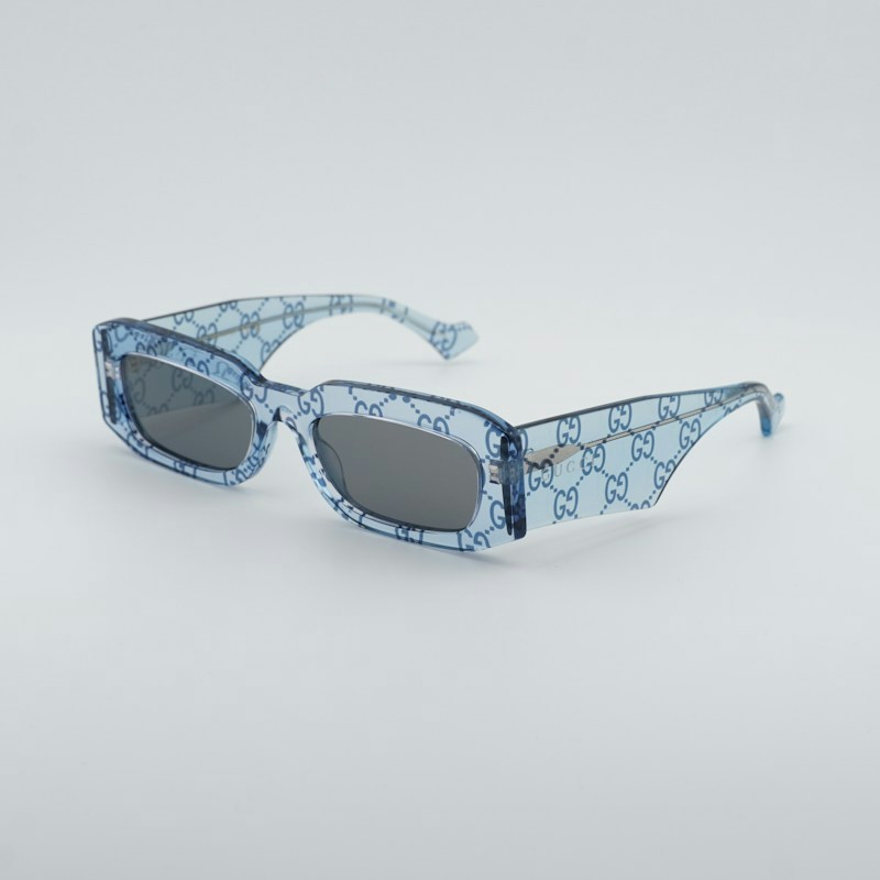 Occhiali da sole Gucci GG1426S 006 quadrati blu chiaro con motivo GG/grigio