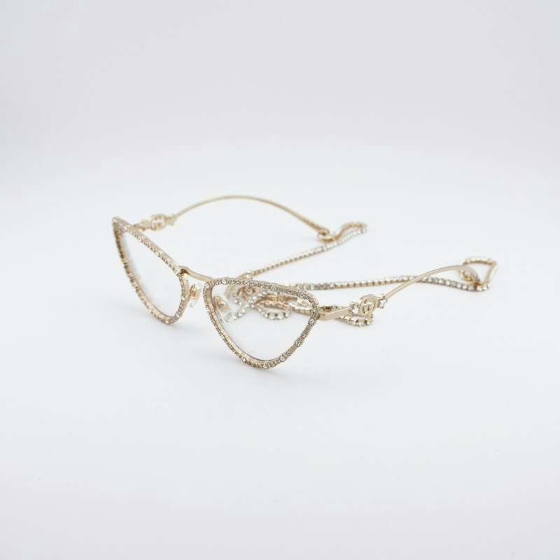 Gucci GG1569S 002 Cat Eye Sunglasses Gold with White Stone / Brown