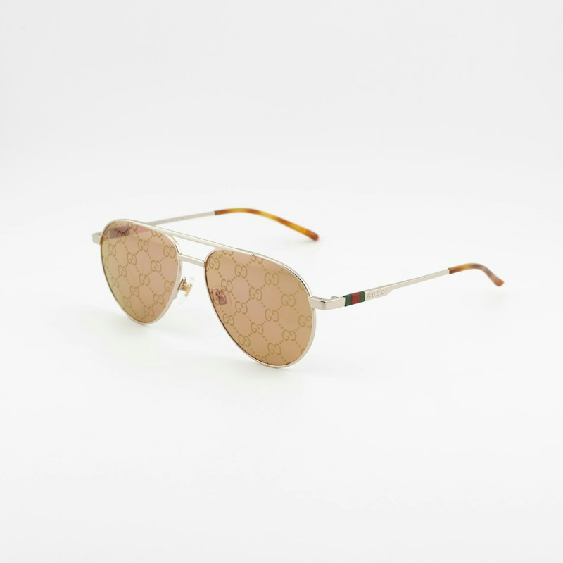 Occhiali da sole Gucci GG1679S 002 Aviator giallo oro lucido con motivo logo GG