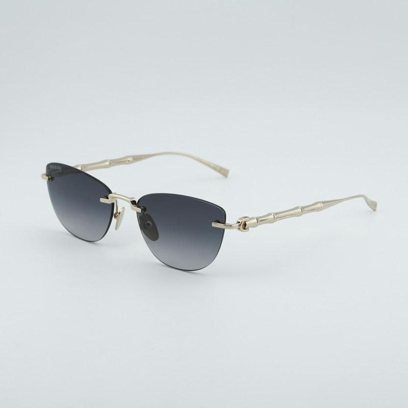 Occhiali da sole Gucci GG2063S 001 Cat Eye Shiny Endura Gold/Grey Gradient