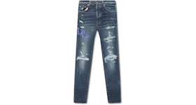AMIRI Distressed Skinny Jeans Blue