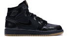 Jordan 1 Retro Negro Gum (para escolares)