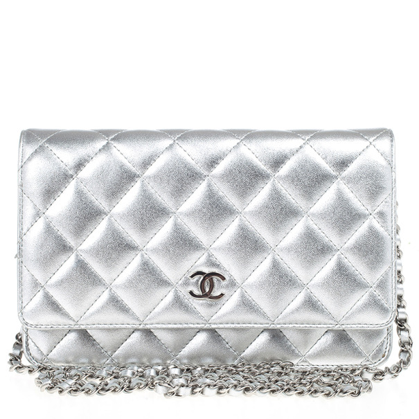 CHANEL FIVE CHAIN FLAP BAG quilted lambskin with five silver tone and  leather chains along the side and portion of the bottom interlocked CC  lock monogram fabric lining authenticity card 26cm x