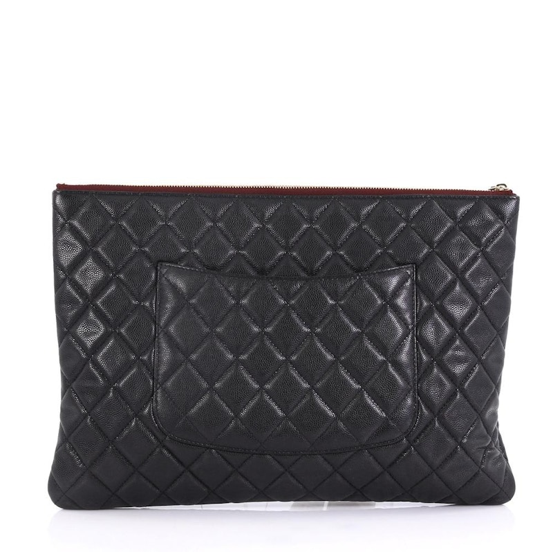 Chanel O Case Clutch Quilted Caviar Large Black in Caviar with