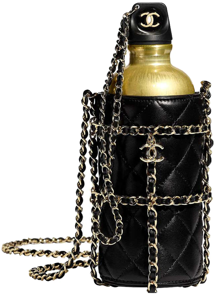 A BLACK LAMBSKIN LEATHER HOT WATER BOTTLE HOLDER WITH GOLD