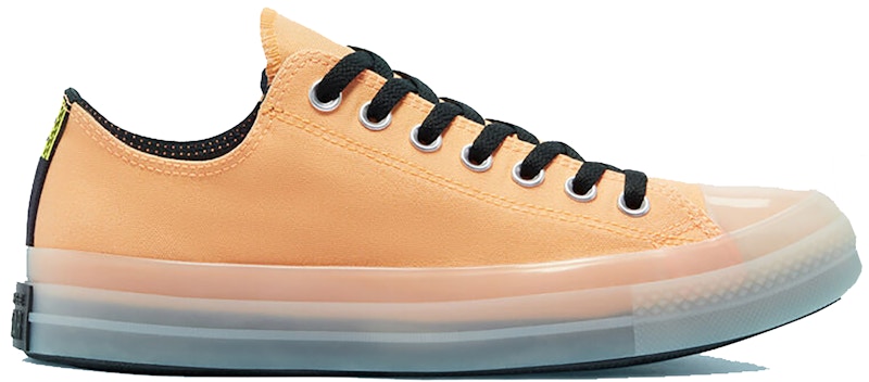 orange low top chuck taylors