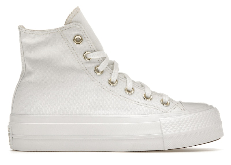 White converse hotsell gold eyelets