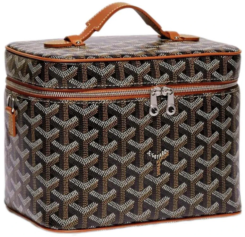A 1940's Goyard vanity case with matching suitcase, each with tan