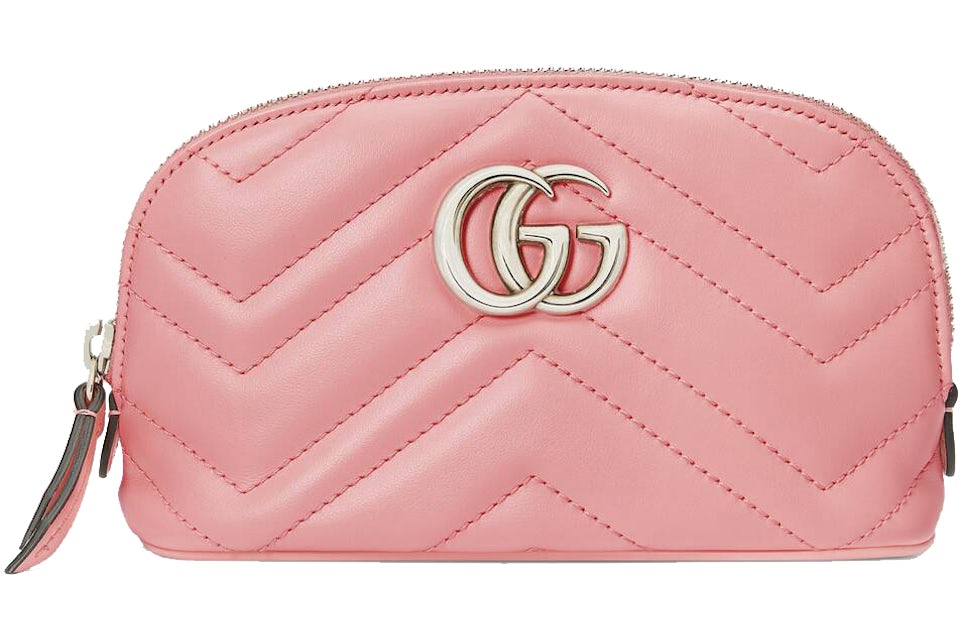 Sold. Gucci cosmetic pink pouch