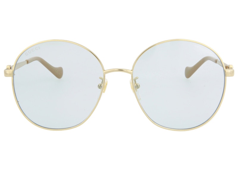 Round frame metal outlet gucci sunglasses