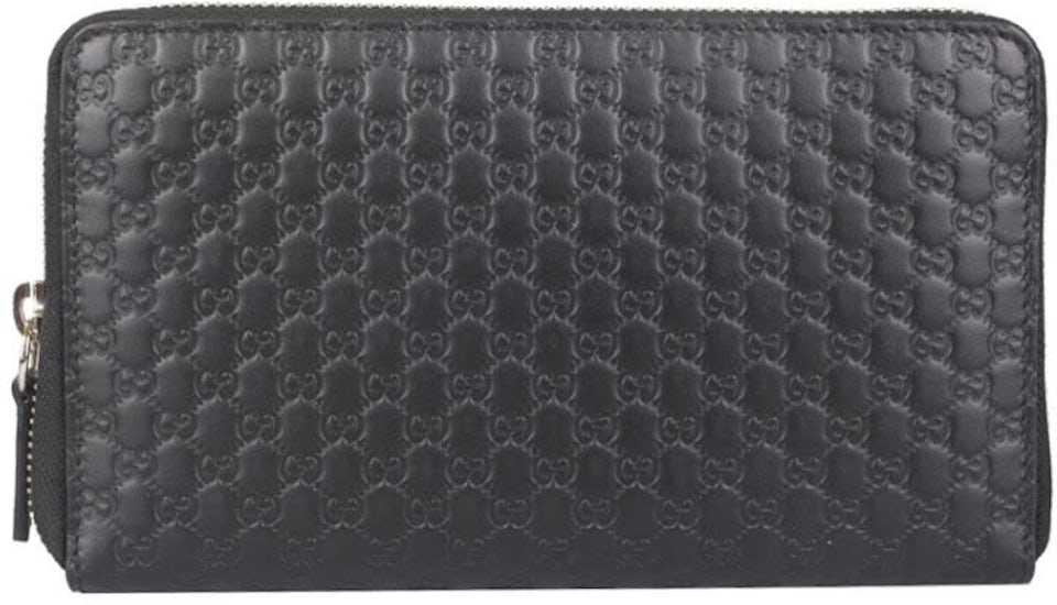 GG Marmont zip around wallet in black leather and GG Supreme
