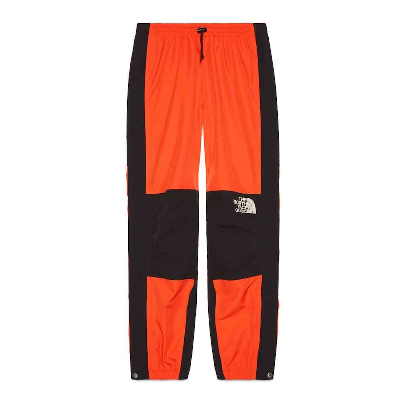 Orange north face store pants