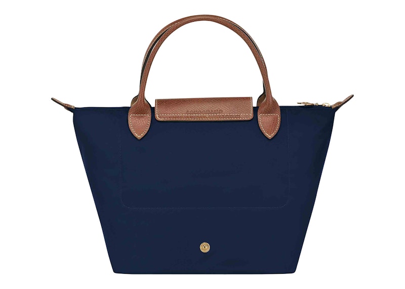 Navy blue purse with hotsell brown handles