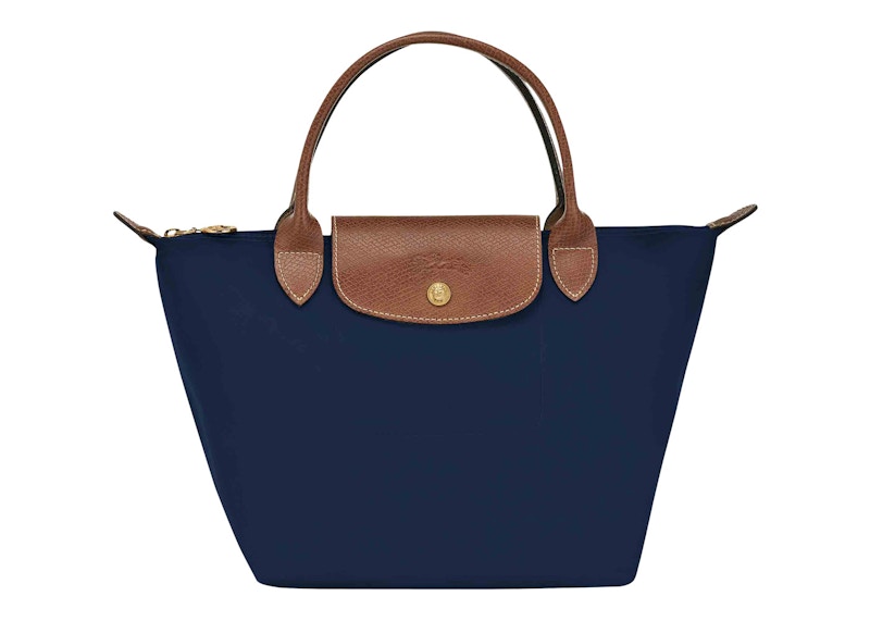 Navy blue purse shop with brown handles