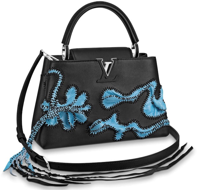 Louis Vuitton has designer handbags at Artycapucines