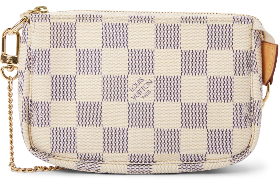 Pochette accessoire leather handbag Louis Vuitton White in Leather