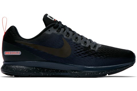 Nike air zoom pegasus 34 negro dorado hot sale