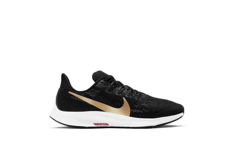 Nike pegasus deals gold and black