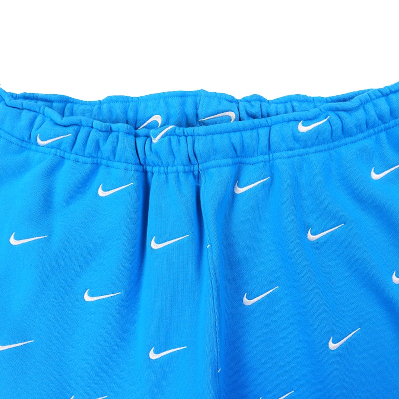 nike logo all over sweatpants