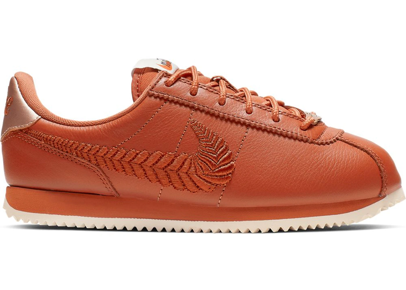 Peach nike cortez sales