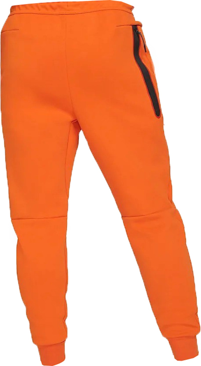 Orange nike hot sale tech fleece pants