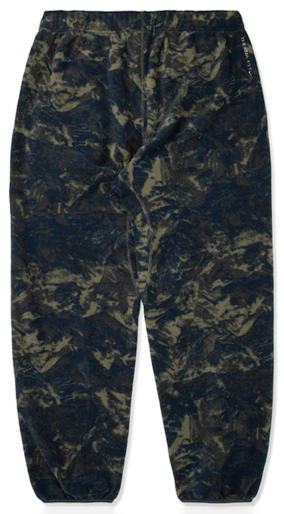 https://images.stockx.com/images/Nike-NikeLab-ACG-Therma-Fit-Wolf-Tree-Pants-Thunder-Blue-Dark-Smoke-Grey-Light-Stone-2.jpg?fit=fill&bg=FFFFFF&w=700&h=500&fm=webp&auto=compress&q=90&dpr=2&trim=color&updated_at=1693413305?height=78&width=78
