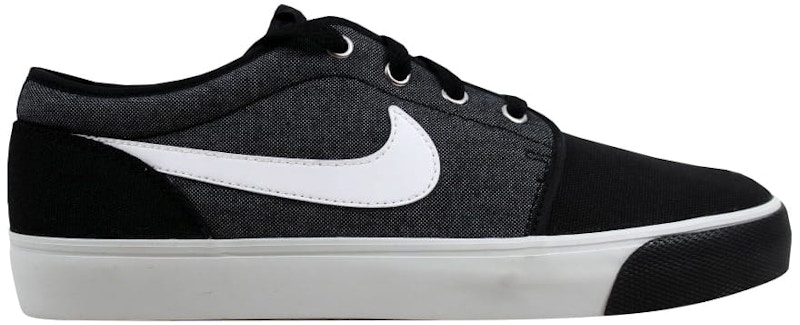 Nike toki low black best sale and white