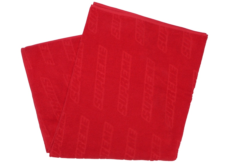 Supreme debossed logo beach towel red