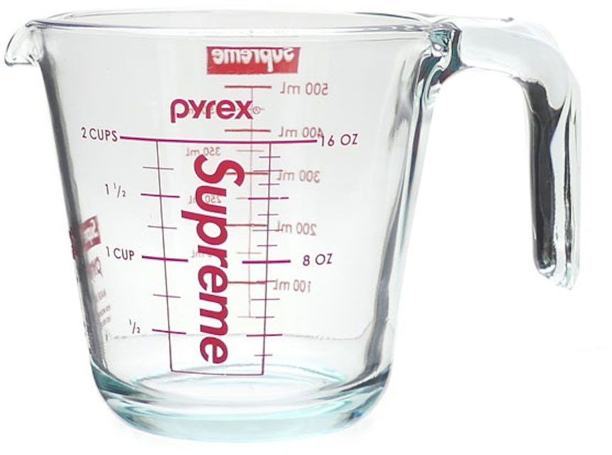 Sold at Auction: 2- PYREX GLASS MEASURING CUPS