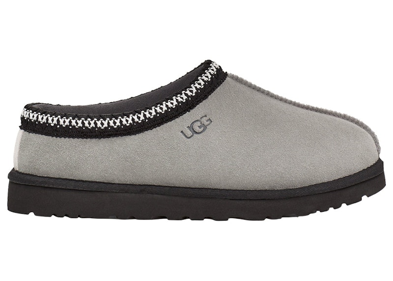 Grey and 2024 black ugg slippers