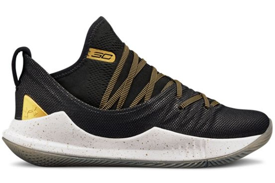 Under armour hot sale shoes kids gold