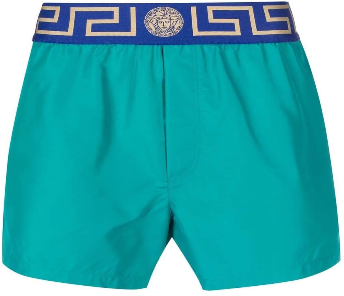 Greca border swim shorts in blue - Versace