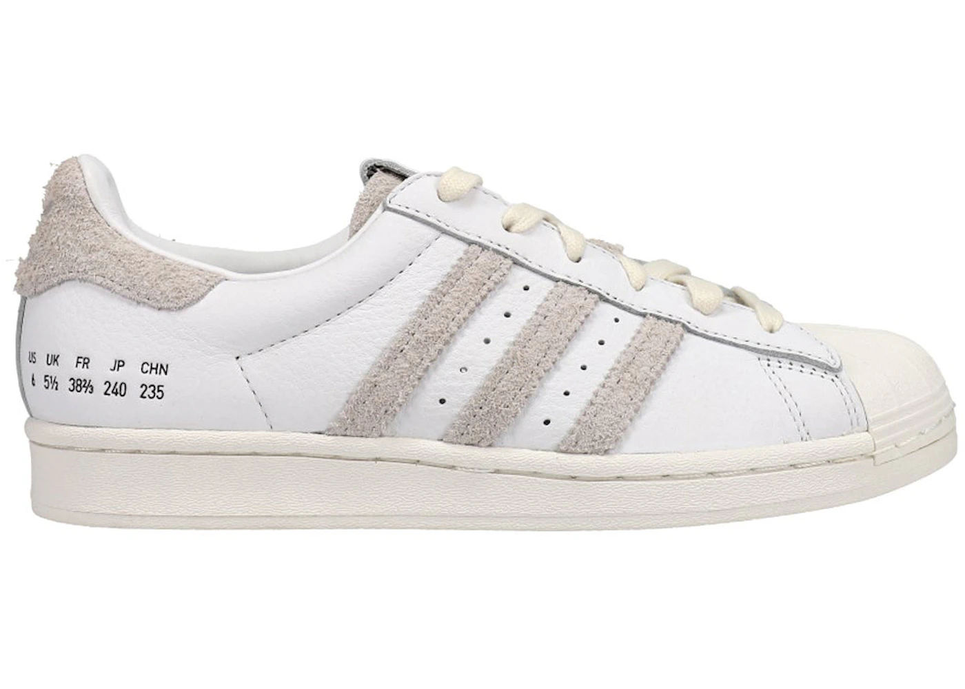 Tan and white adidas Clearance
