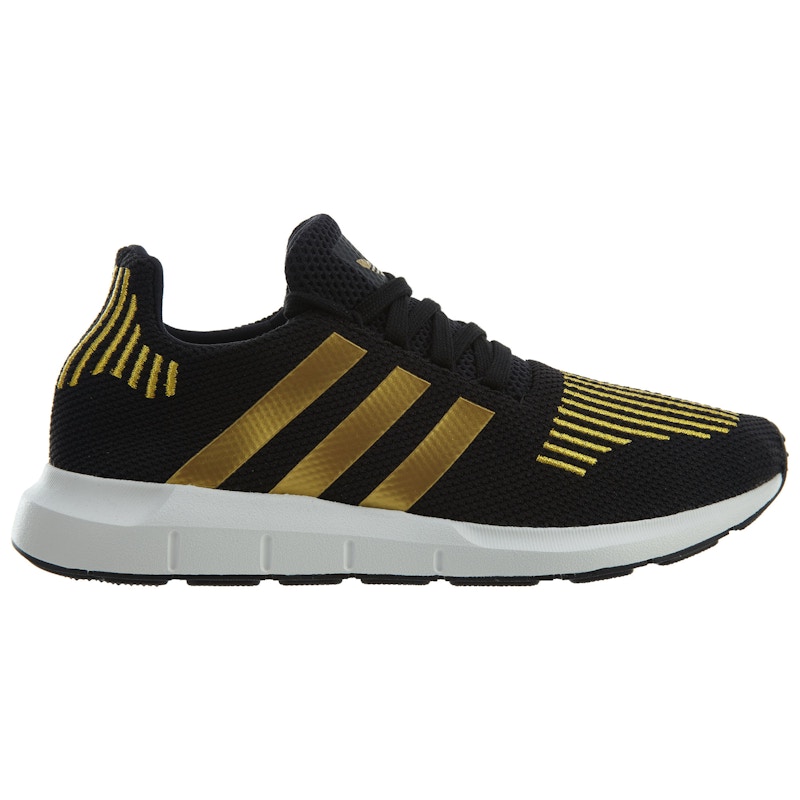 Adidas black sneakers shop with gold trim