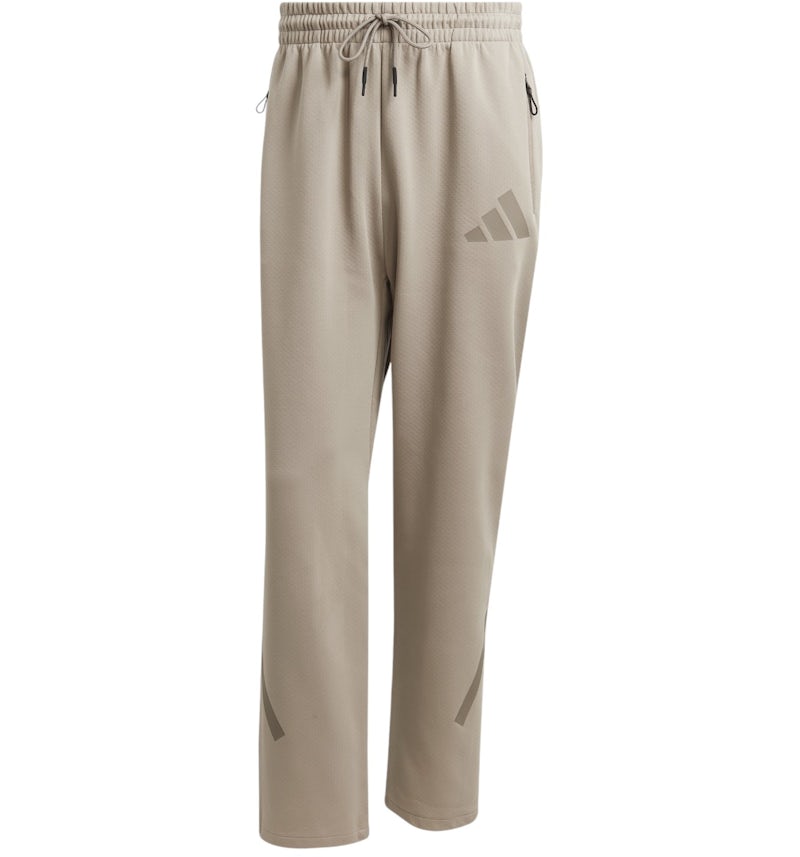 Pantaloni adidas con orlo aperto Putty Beige Uomo SS25 IT
