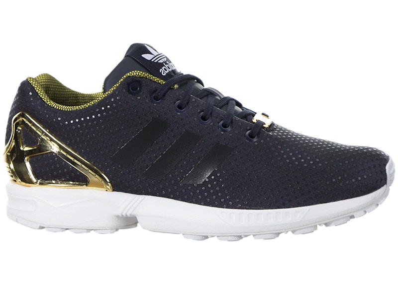 Adidas flux 2025 nere e oro