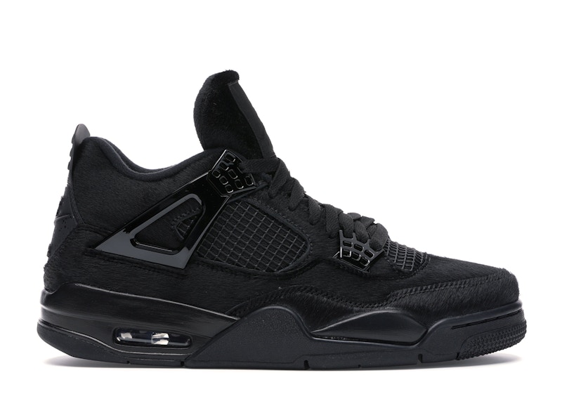 blacked out jordan 4